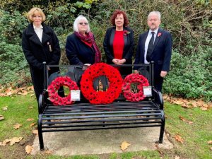 Councillors Claire Douglas, Maggie Allen, and Michael Campbell, together with Ollie Lyons from East Hunsbury WI, who laid wreaths on behalf of the community.